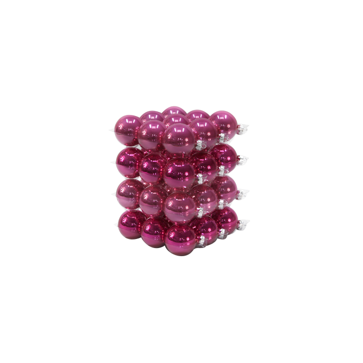 Pyramide de boules roses brillantes, empilées en forme géométrique.