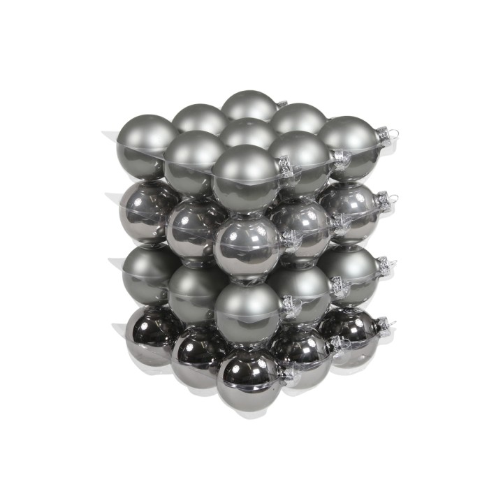 Empilement de boules métalliques argentées, brillantes et mates, créant un effet de profondeur.