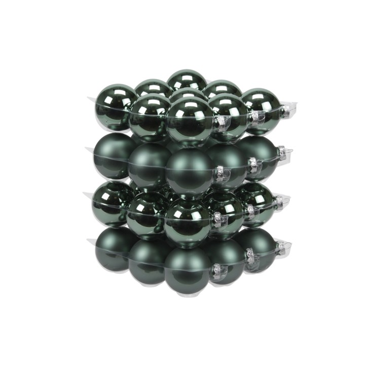 Boules décoratives sphériques en verre vert, brillantes et empilées en plusieurs rangées.
