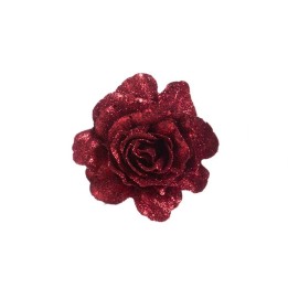 Fleur rouge scintillante, pétales en forme de rose, éclat lumineux et texture douce.