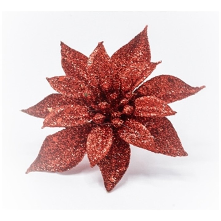 Fleur scintillante rouge aux pétales brillants, sur fond blanc éclatant.