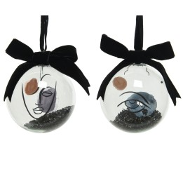 Boules décoratives en verre, visages stylisés, teintes douces, accents noirs en velours.