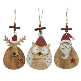 Décorations en bois pour Noël, représentant un renne, une chouette et le Père Noël.