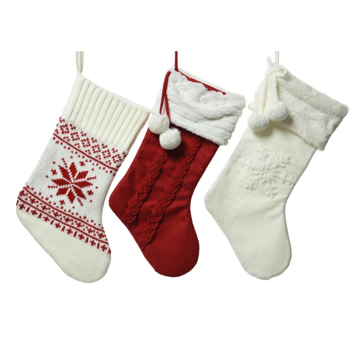 Chaussettes de Noël tricotées, rouge, blanc, avec motifs et pompons douillets.