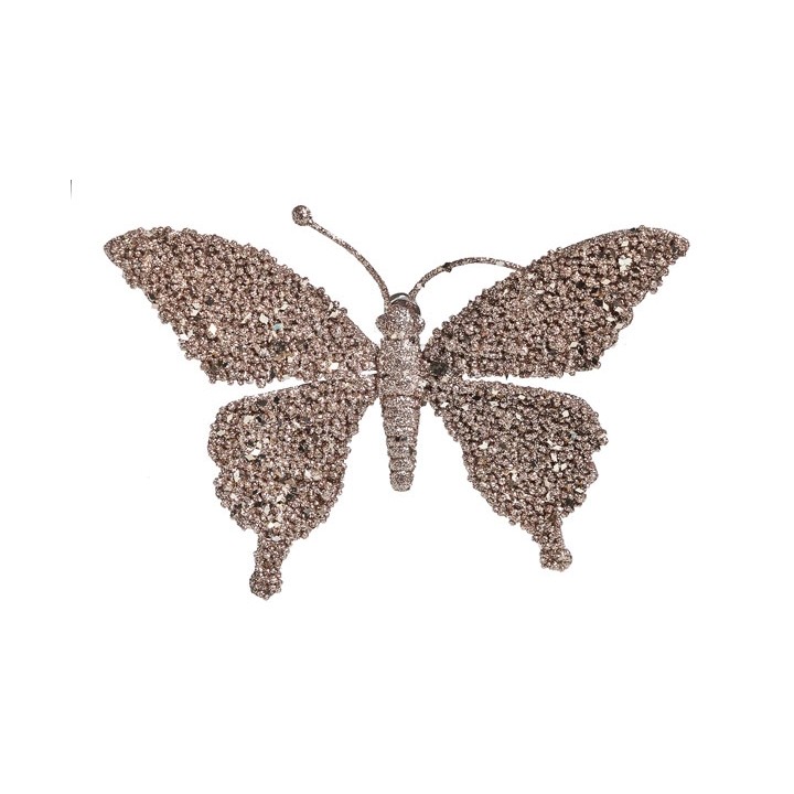 Papillon scintillant en strass, aux ailes brillantes et texturées, dans des tons dorés.