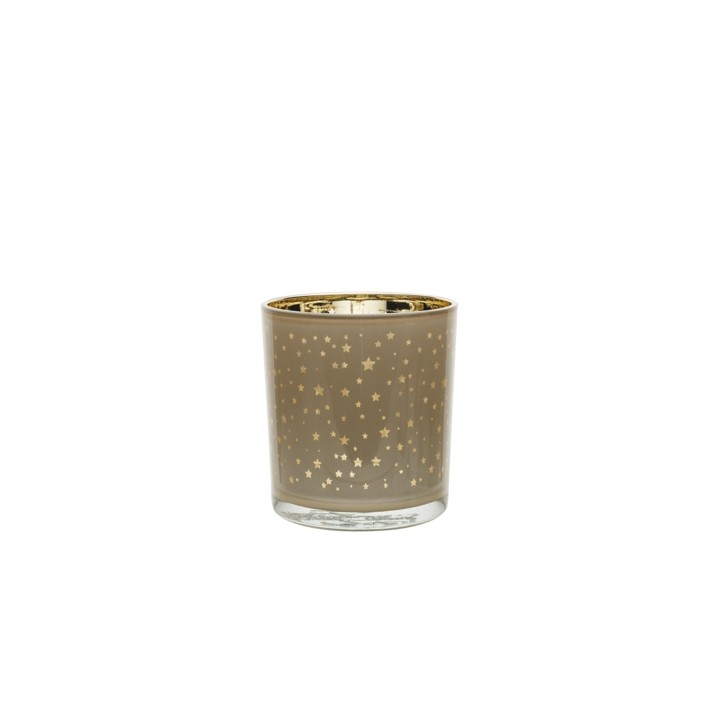 Vase en verre transparent décoré d'étoiles dorées sur fond beige.