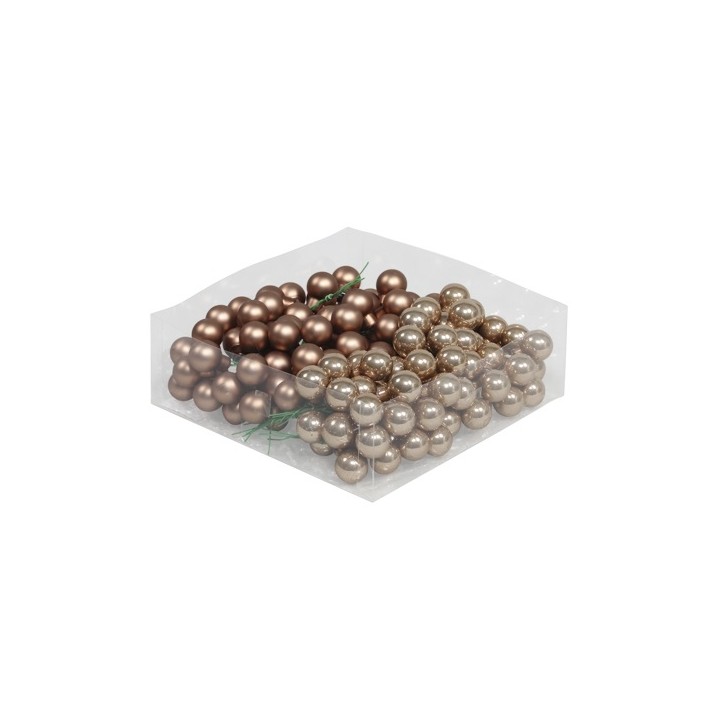Perles décoratives en bronze, brillantes et mates, disposées en grappes sur fond transparent.