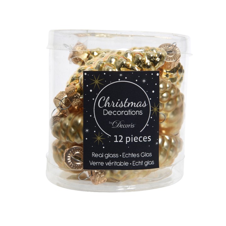 Boules de Noël dorées en verre, brillantes et scintillantes, emballées dans un pot transparent.