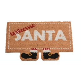 Tapis en jute avec inscription "Welcome Santa" et bottes de Noël en noir et rouge.