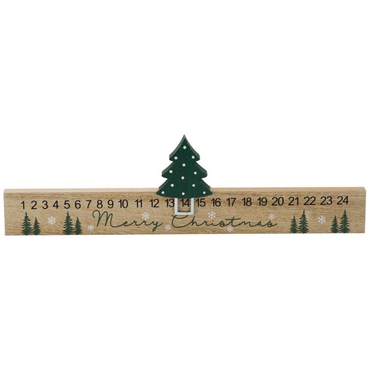 Règle en bois décorée d'un sapin et de flocons pour Noël.