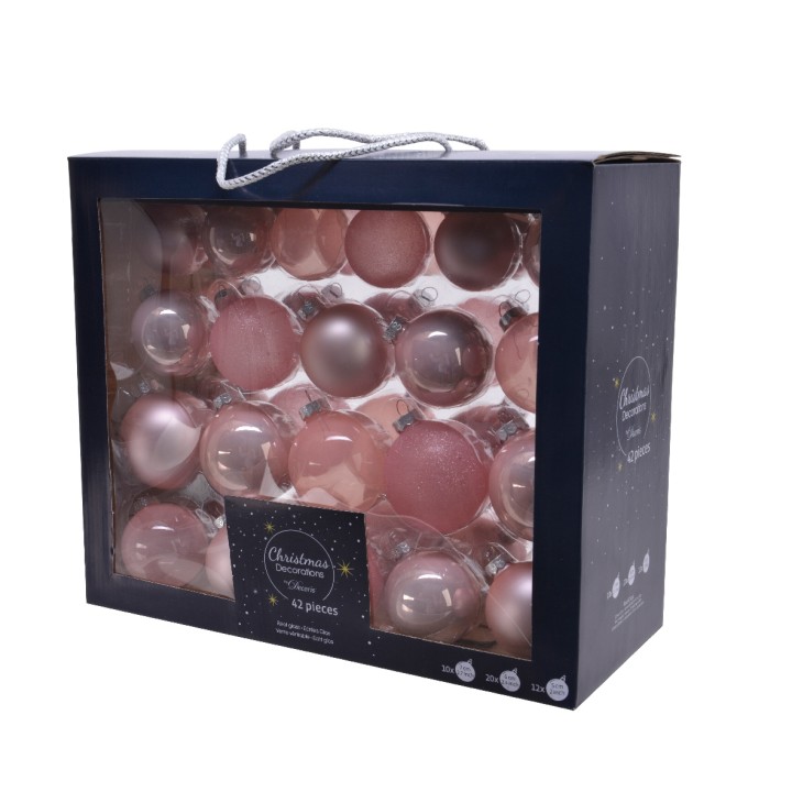 Ensemble de boules de Noël roses, brillantes et mates, dans une boîte élégante.