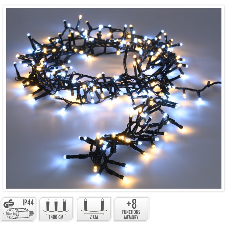 Guirlande lumineuse aux ampoules blanches et bleues sur fond noir, festive et scintillante.
