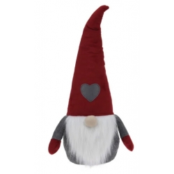 Gnome en tissu, chapeau rouge pointu, barbe blanche, cœur gris sur le ventre.