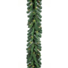 Guirlande verte éclatante, ornée de lumières, évoquant l'esprit des fêtes.