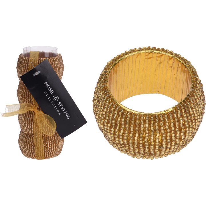 Bracelet doré texturé, scintillant, en perles, accompagné d'un rouleau décoratif.
