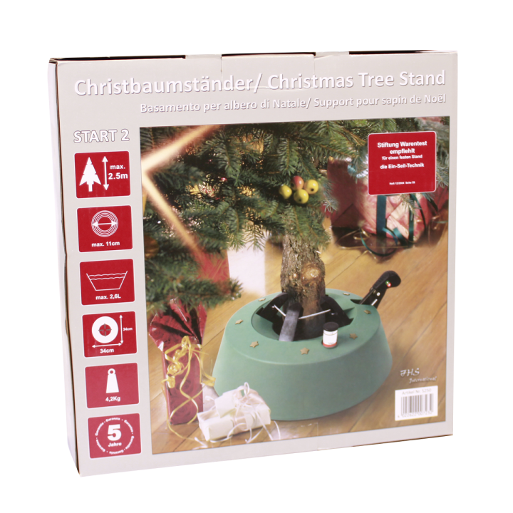 Support de sapin de Noël vert avec fixation, sur fond de boîte illustrée.
