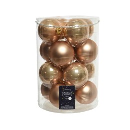 Boules de Noël dorées et cuivrées, rangées dans un pot transparent.