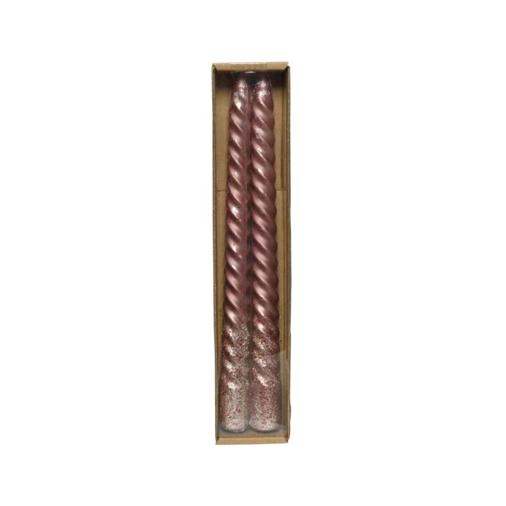 Deux bougies torsadées rose poudré, légèrement scintillantes, présentées dans un élégant ...