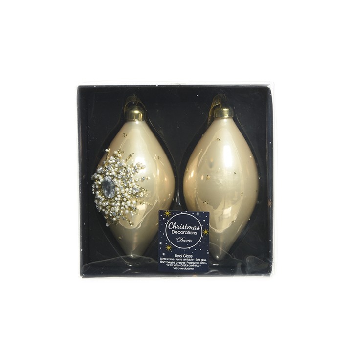 Deux ornements dorés en forme de goutte, un orné de perles brillantes, présentés dans une bo?...