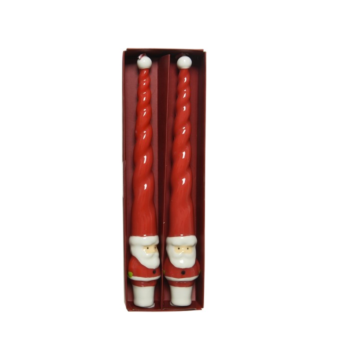 Deux cônes rouges, spirales, ornés de petits bonhommes de Noël, dans une boîte festive.