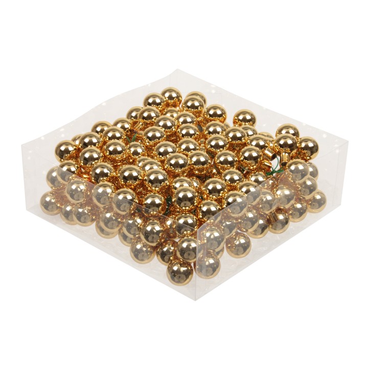 Boules dorées brillantes regroupées dans un emballage transparent.