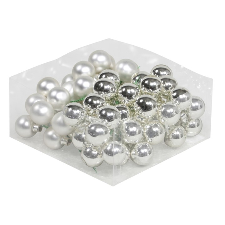 Perles blanches et argentées brillantes, disposées en un joli mélange lustré.