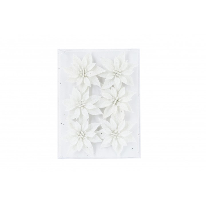 Arrangements floraux blancs en relief sur fond clair, élégance et douceur.