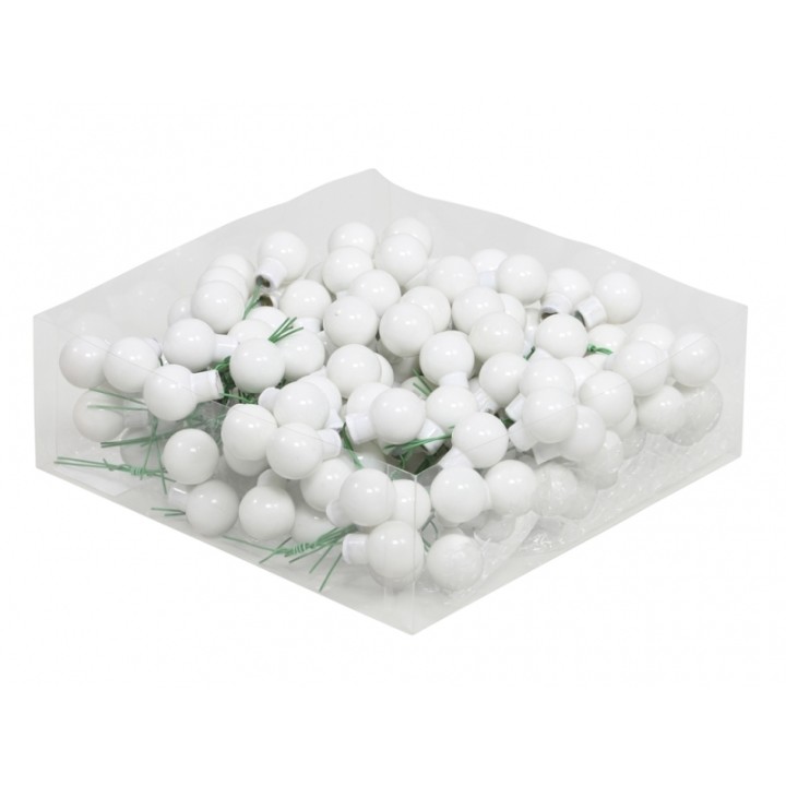 Boules blanches en plastique sur tiges vertes, disposées en vrac dans un sachet transparent.