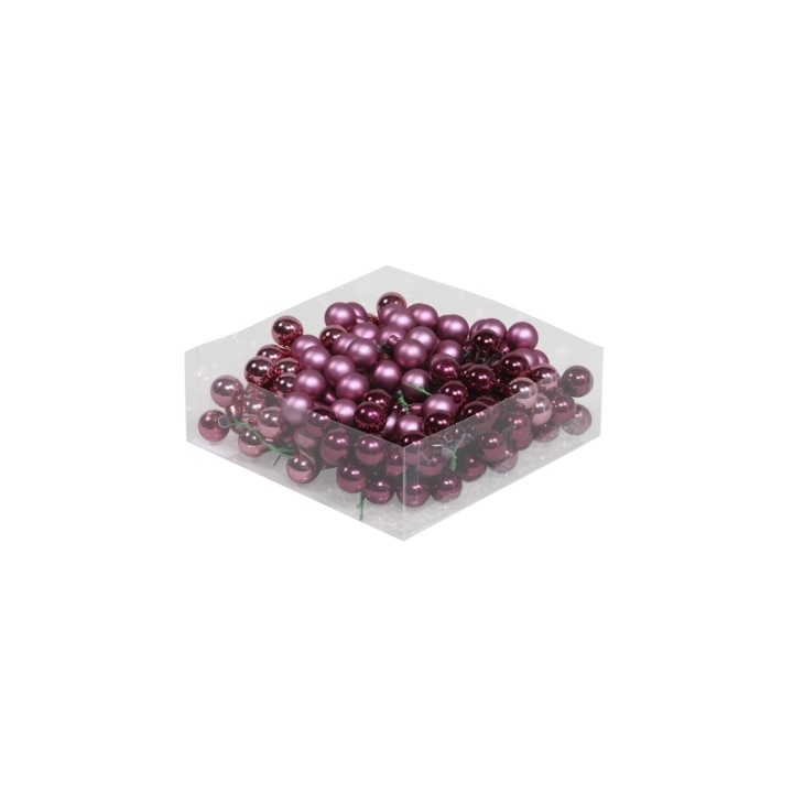 Perles violettes brillantes dans un écrin transparent, créant un effet élégant et luxueux.