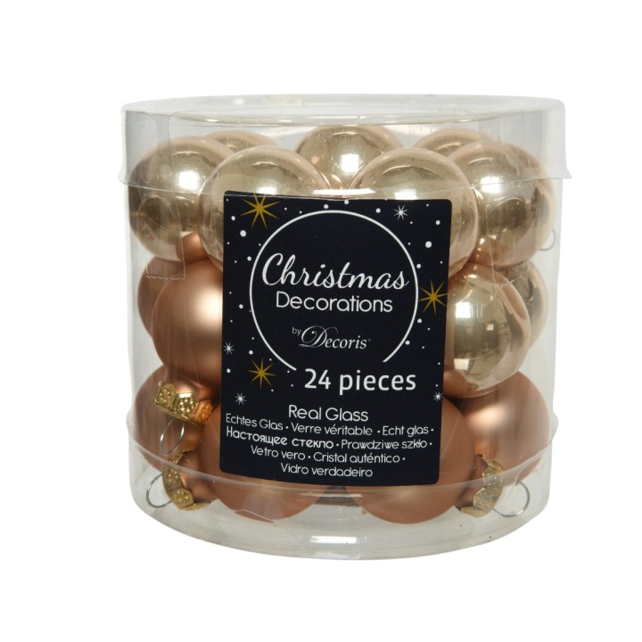 Boules de Noël en verre, dorées et cuivrées, présentées dans un pot transparent.