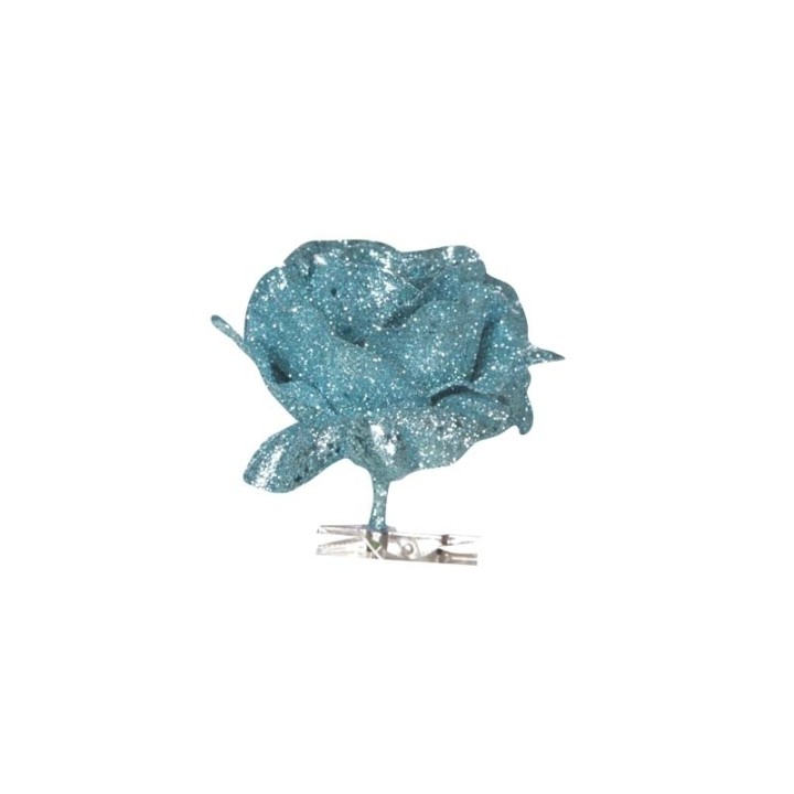 Rose scintillante turquoise sur tige transparente, éclat et élégance réunis.