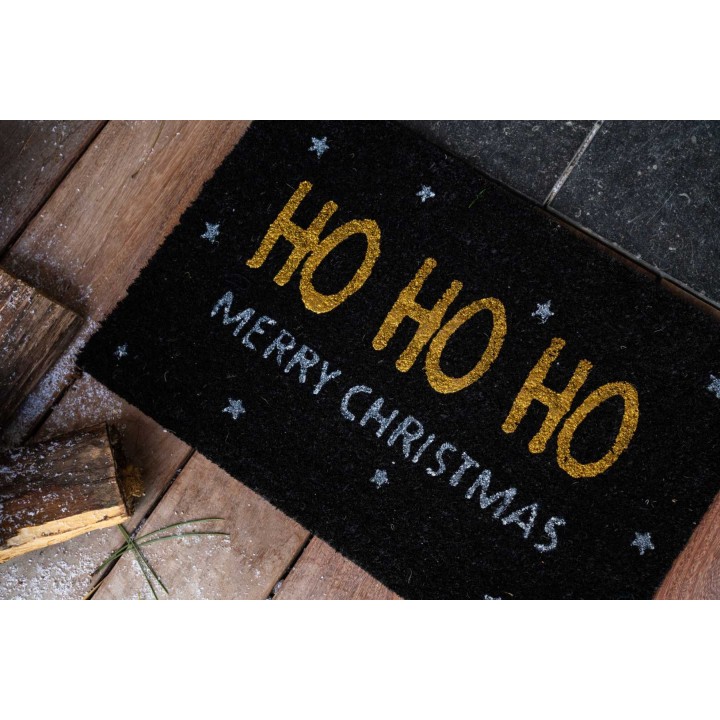 Tapis de bienvenue noir avec inscriptions dorées et blanches pour Noël.