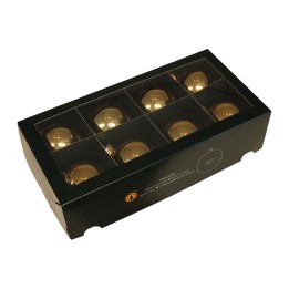 Boîte noire élégante contenant neuf boules dorées brillantes.
