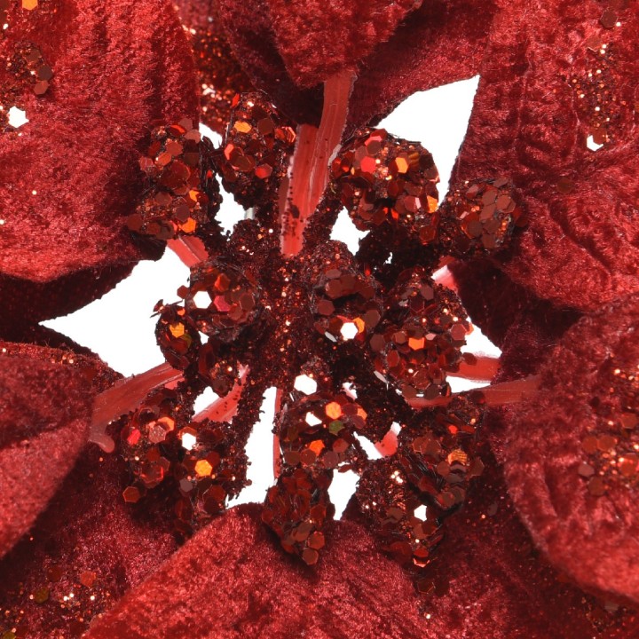 Fleur rouge éclatante ornée de paillettes scintillantes, créant un effet brillant.