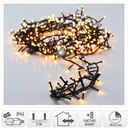 Guirlande lumineuse noire ornée de petites ampoules dorées scintillantes.