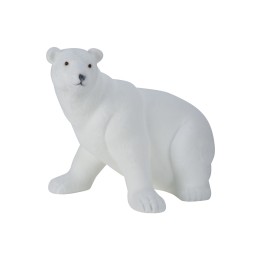 Ourson en plastique blanc, aux formes douces et arrondies, évoquant la neige.