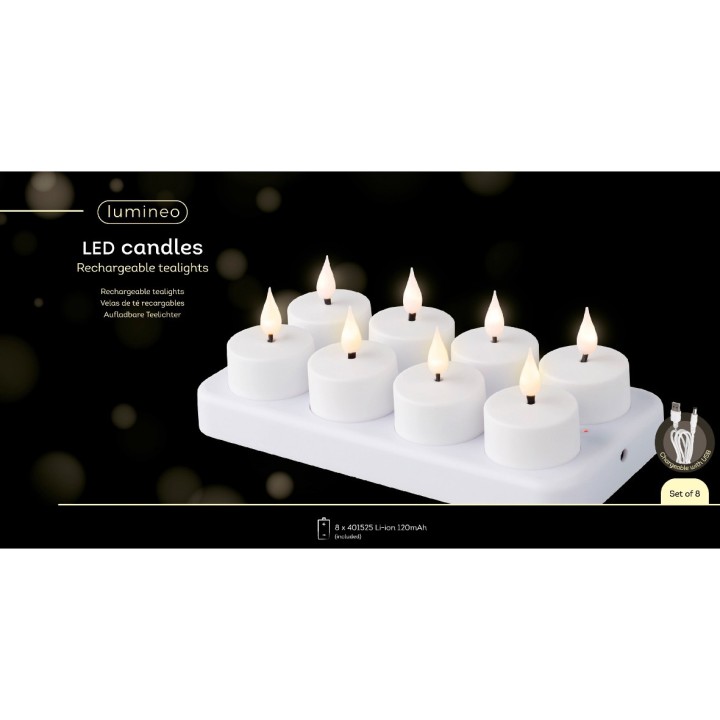 Huit bougies LED blanches sur un support blanc, imitant des flammes vacillantes.