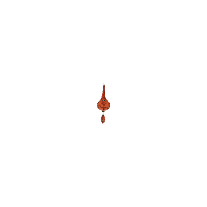 Vase élégant en verre rouge, décoré de motifs floraux raffinés, suspendu avec délicatesse.