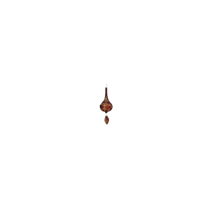 Suspension décorative rouge ornée de motifs dorés, évoquant l'élégance artisanale.