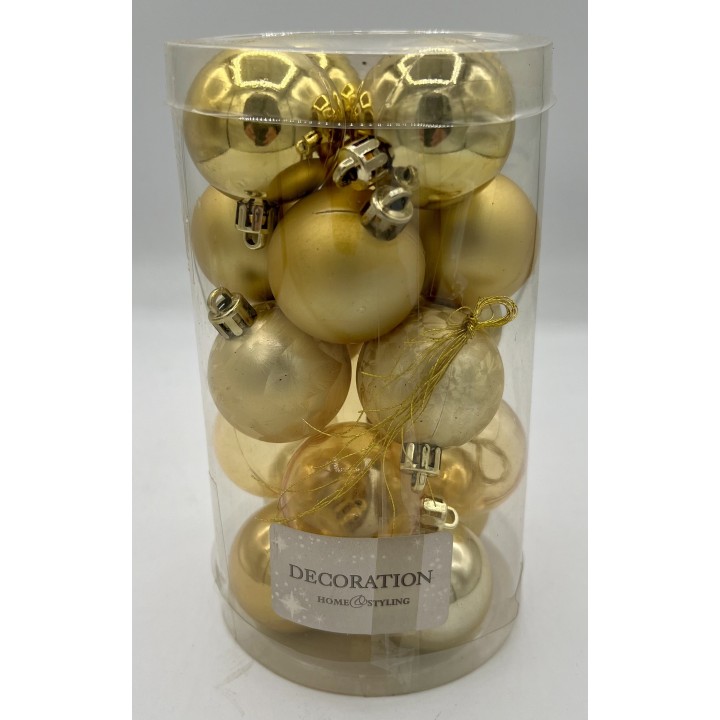 Boules de Noël dorées, variées en textures, présentées dans un élégant contenant transparent.