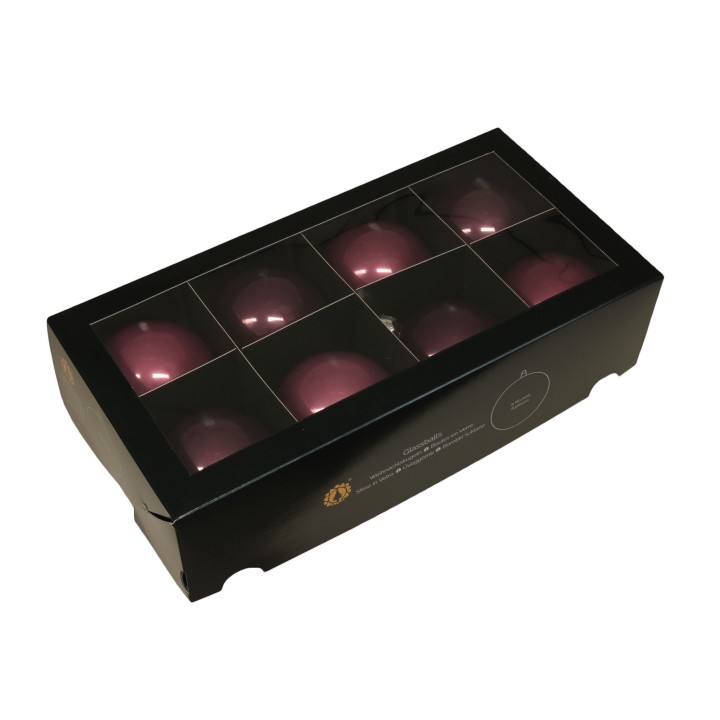 Boîte noire contenant neuf boules violettes brillantes, soigneusement disposées.