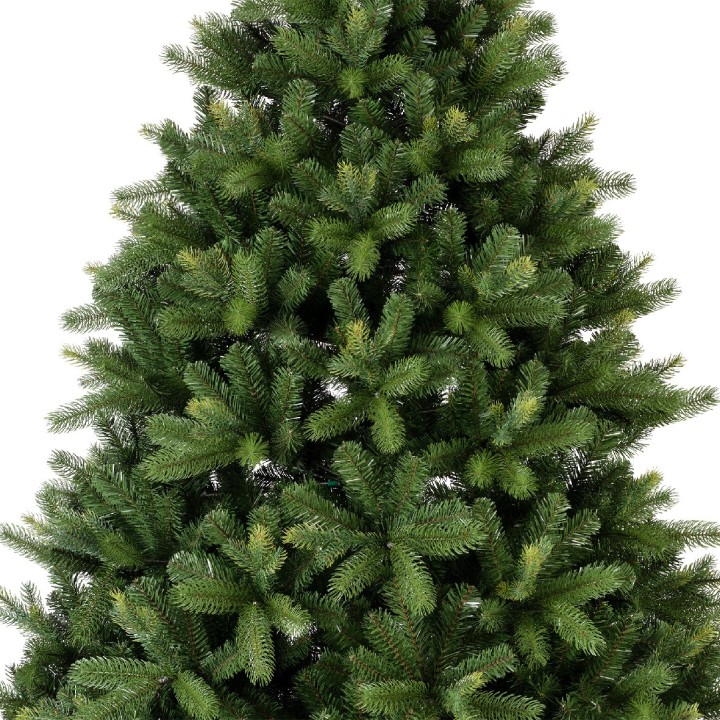 Conifère dense aux branches vertes éclatantes, imitant un sapin naturel.