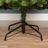 Support métallique noir pour un sapin de Noël, sur un sol en bois clair.