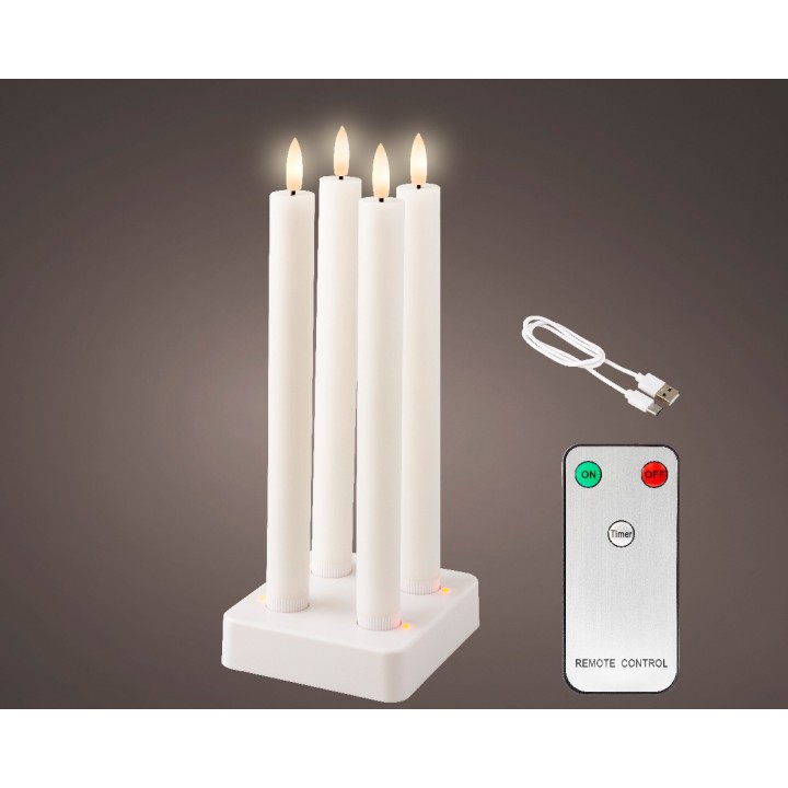 Quatre bougies blanches lumineuses sur un support blanc avec une télécommande.