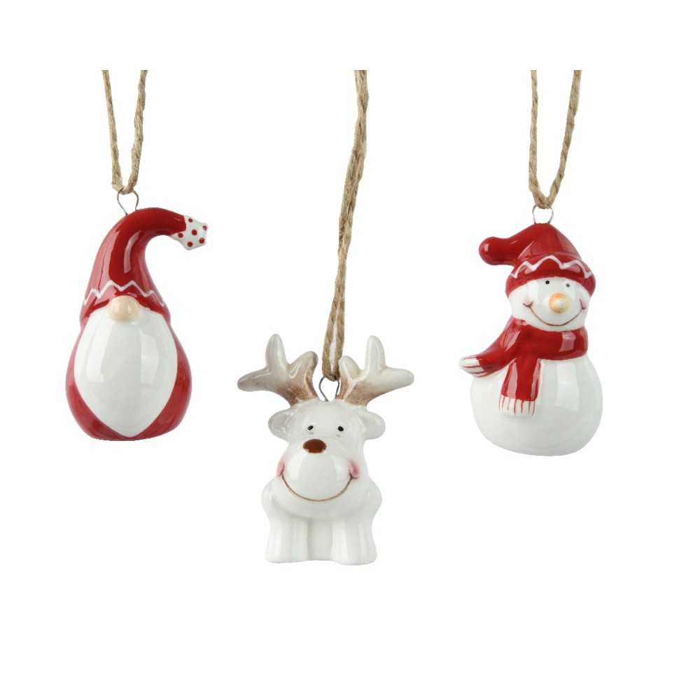 Ornements festifs en céramique : un bonhomme de neige, un renne et un bonnet de Noël.