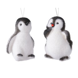 Deux adorables pingouins en peluche, doux et moelleux, avec un contraste de noir et blanc.