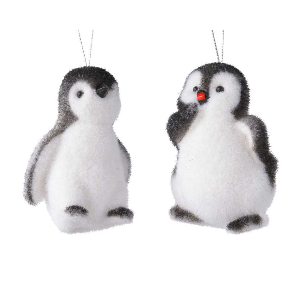 Deux adorables pingouins en peluche, doux et moelleux, avec un contraste de noir et blanc.