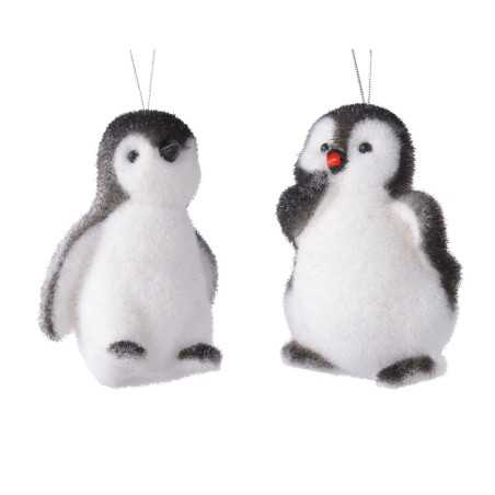 Deux adorables pingouins en peluche, doux et moelleux, avec un contraste de noir et blanc.