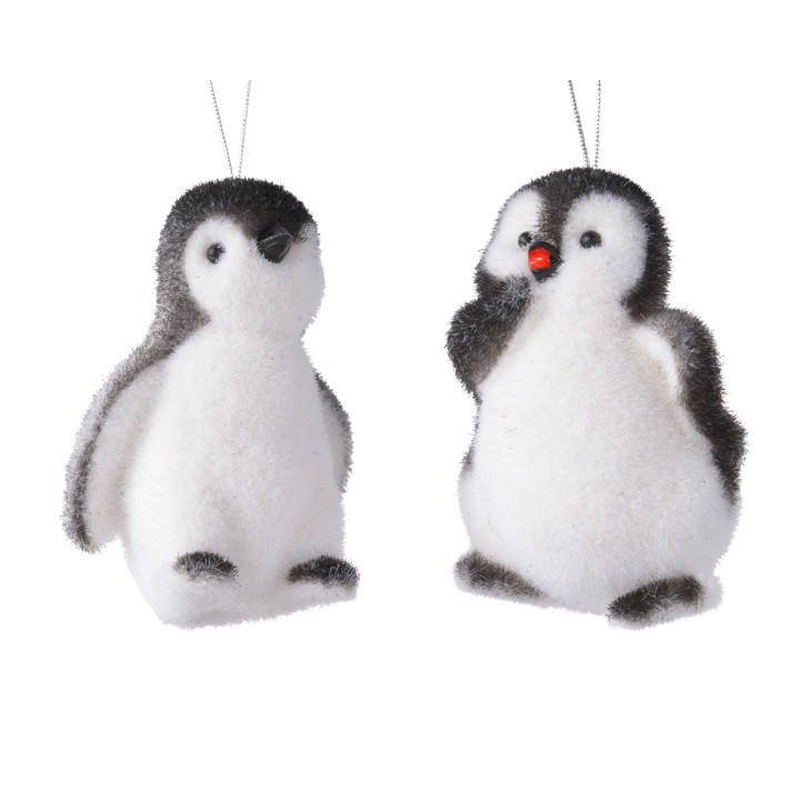 Deux adorables pingouins en peluche, doux et moelleux, avec un contraste de noir et blanc.
