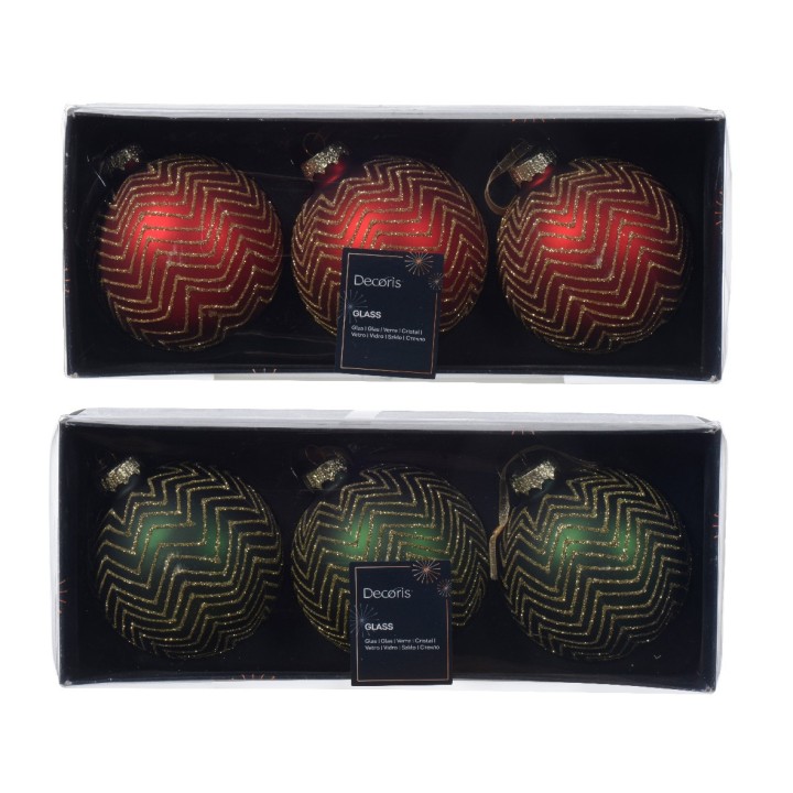 Boules de Noël en verre, rouges, vertes et dorées, avec motifs géométriques.
